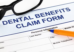 Dental insurance paperwork on a desk