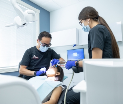 Doctor Hong treating dental patient