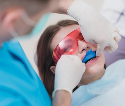 Dental patient receiving fluoride treatment