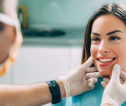 Dentist examining a patient’s teeth
